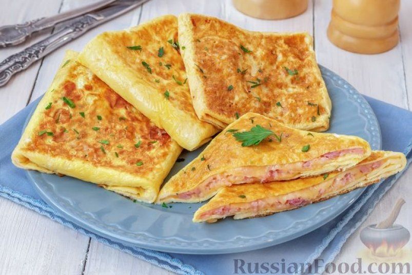Яичные конвертики с сыром и ветчиной: быстрый и сытный завтрак Яичные конвертики с сыром и ветчиной: быстрый и сытный завтрак